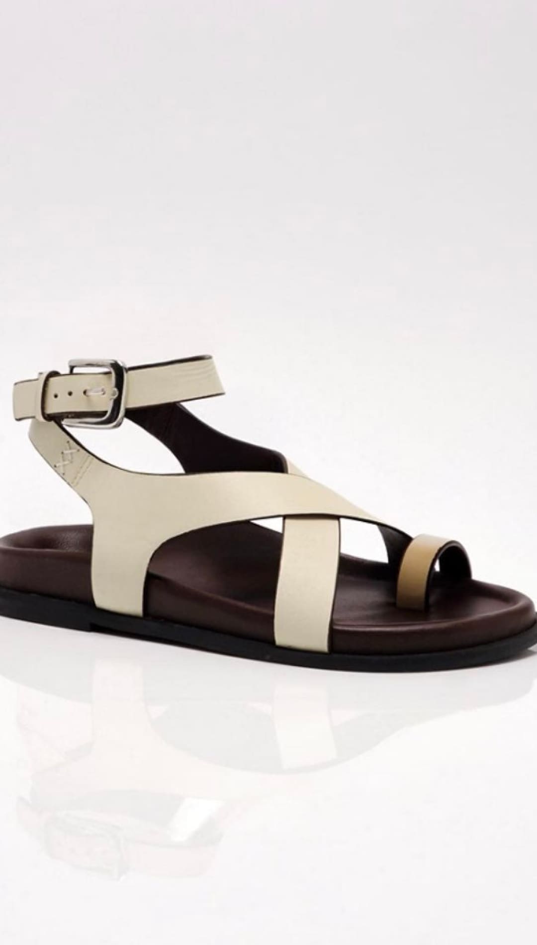 Leather sandal with ankle strap.