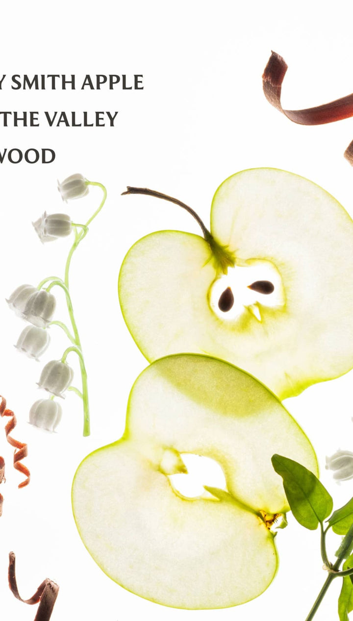 Granny smith apple slices with lily of the valley and cedarwood fragrance notes.