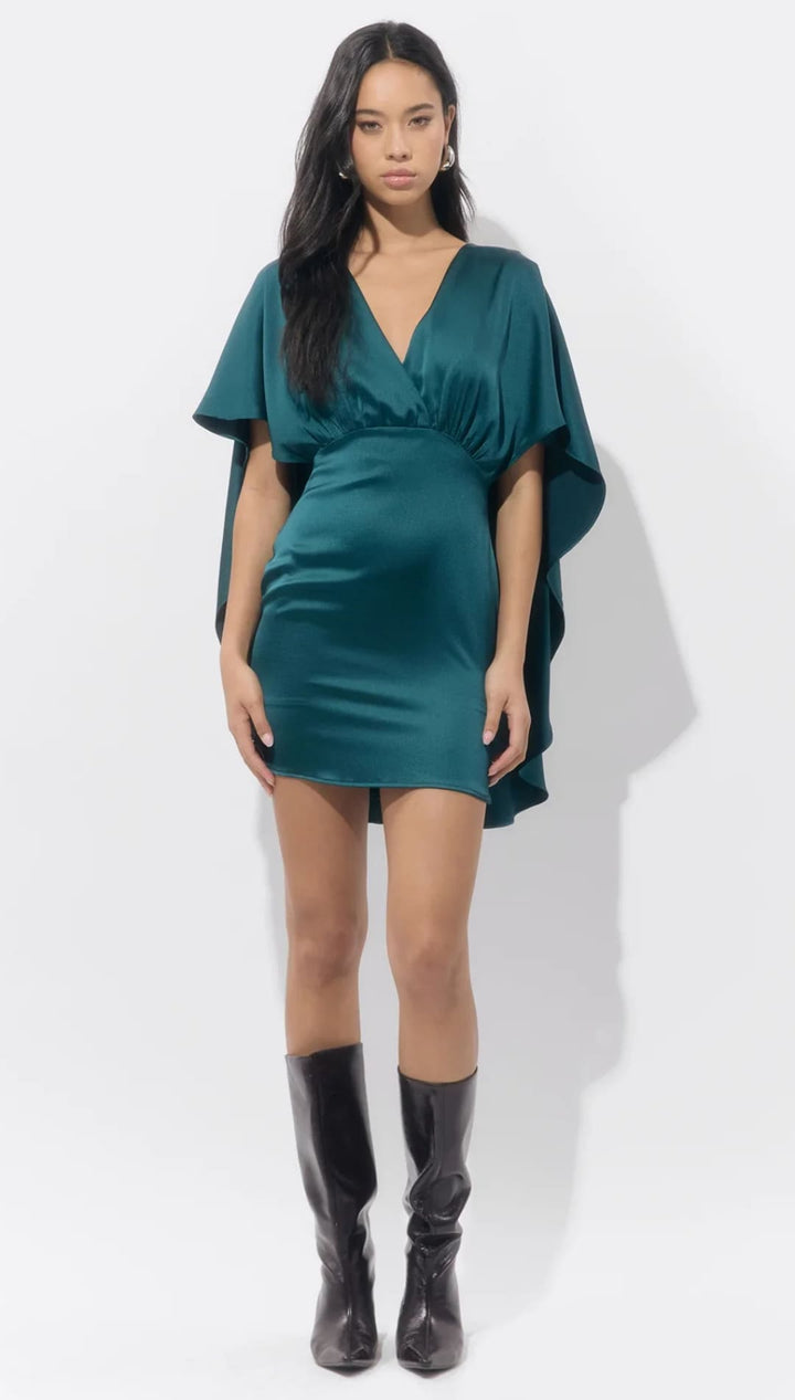Emerald green satin mini dress with ruffled sleeves and a deep v-neckline.