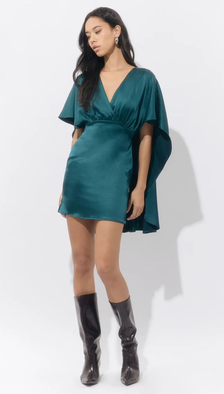 Teal satin mini dress with kimono sleeves and a deep v-neckline.