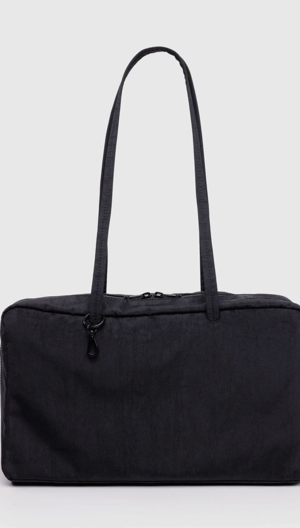 Black nylon tote bag with zipper closure and adjustable shoulder strap.