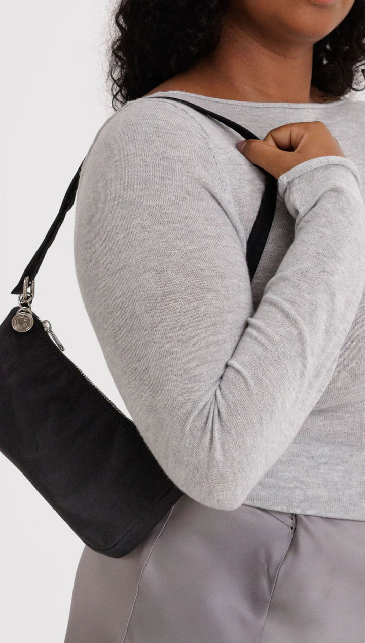 Black leather crossbody bag with silver hardware