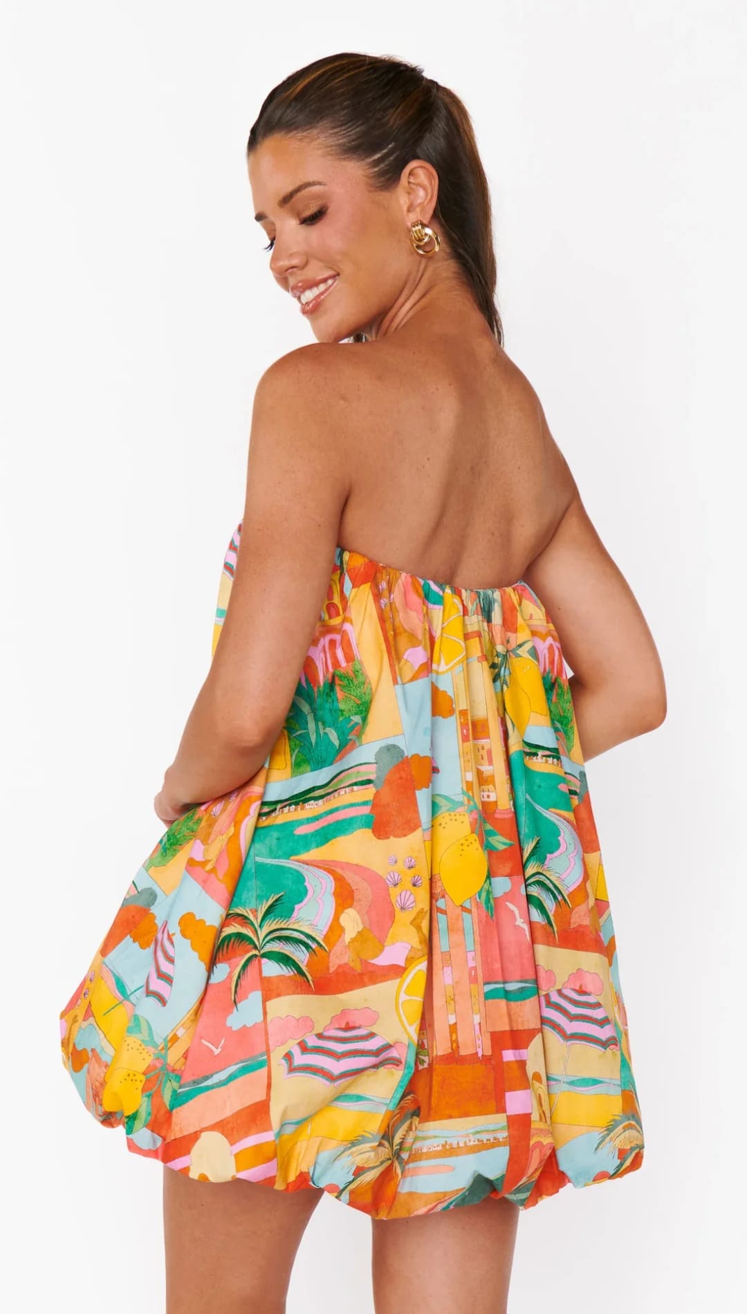 Strapless, colorful, patterned mini dress.