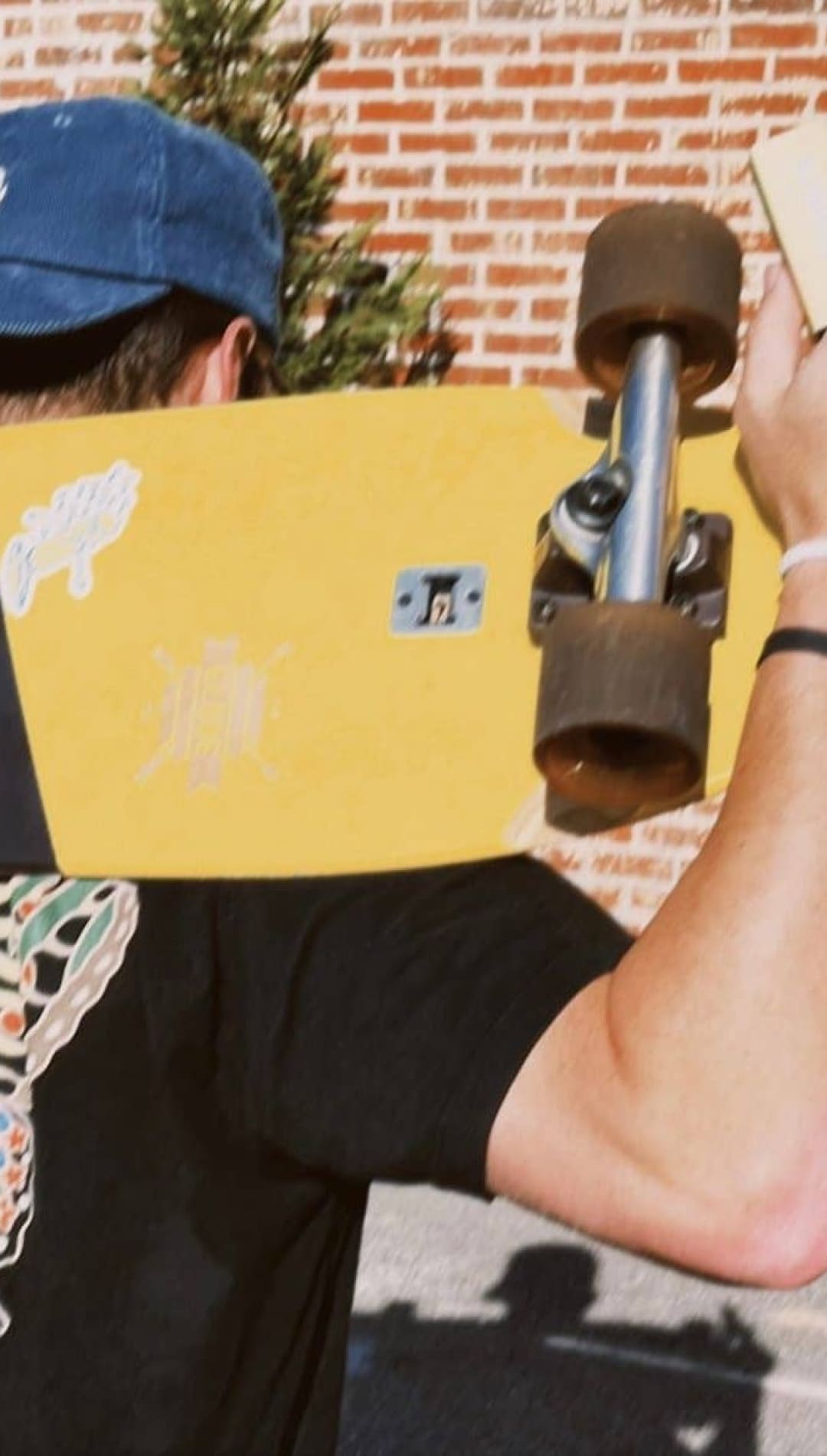 Yellow and black skateboard.
