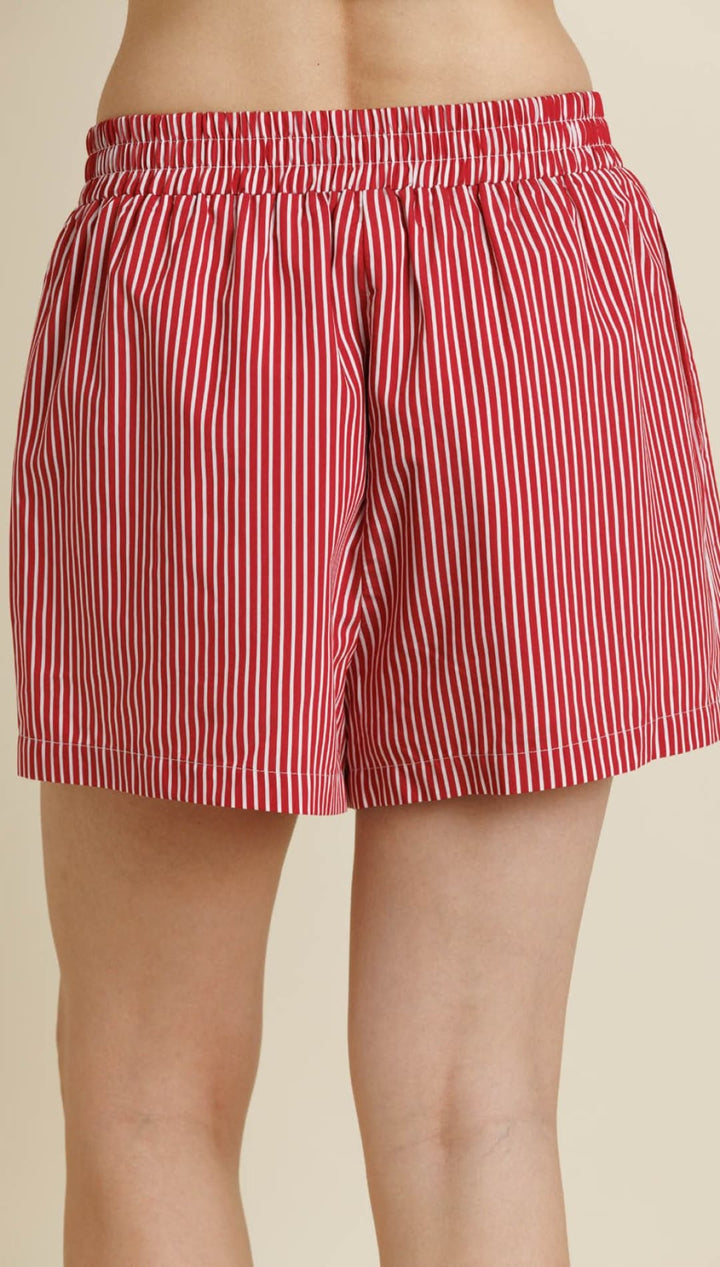 Red and white striped elastic-waist shorts.