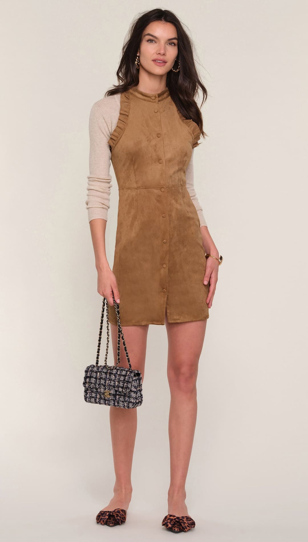 Brown corduroy mini dress with ruffled sleeves and button-down front.