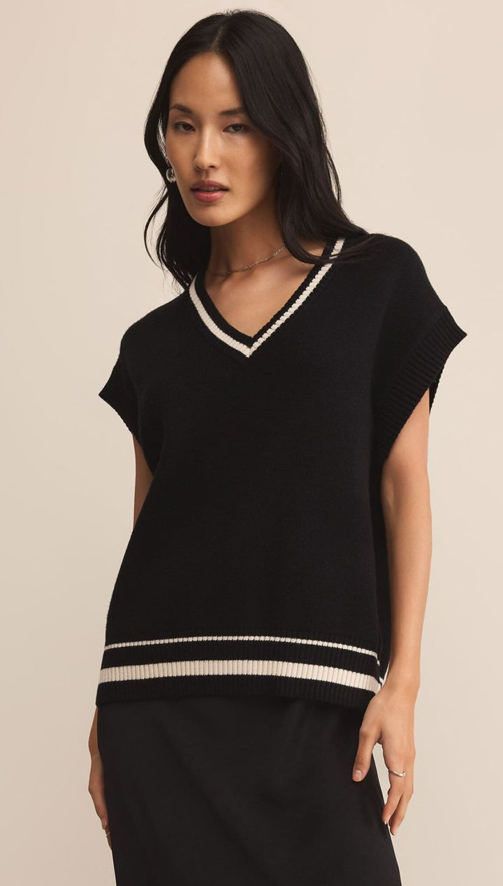 Black and white striped knit top with short sleeves.