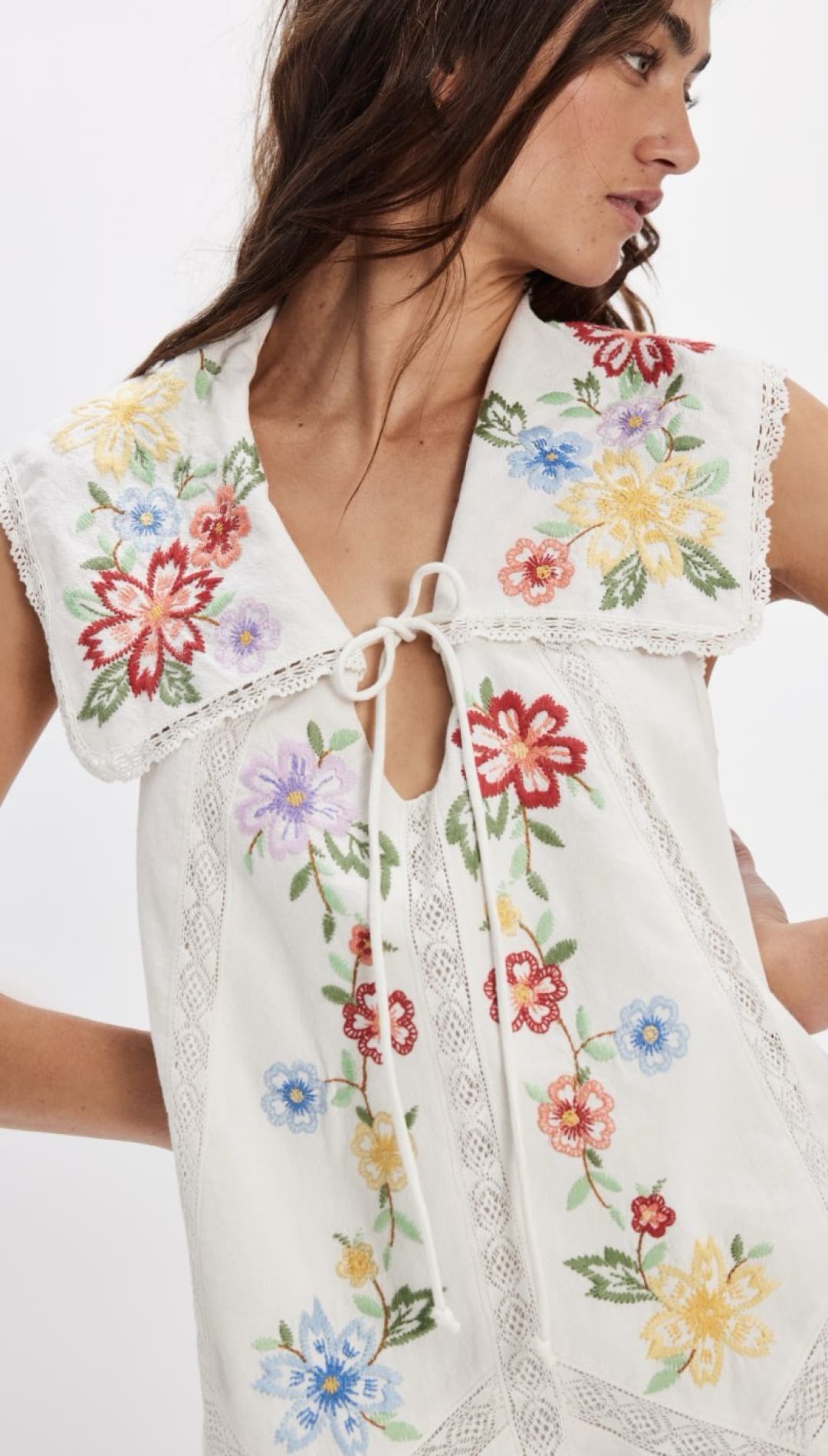 White floral embroidered dress.
