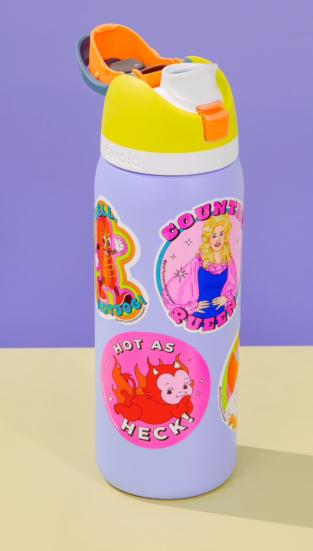 Lavender water bottle with stickers.