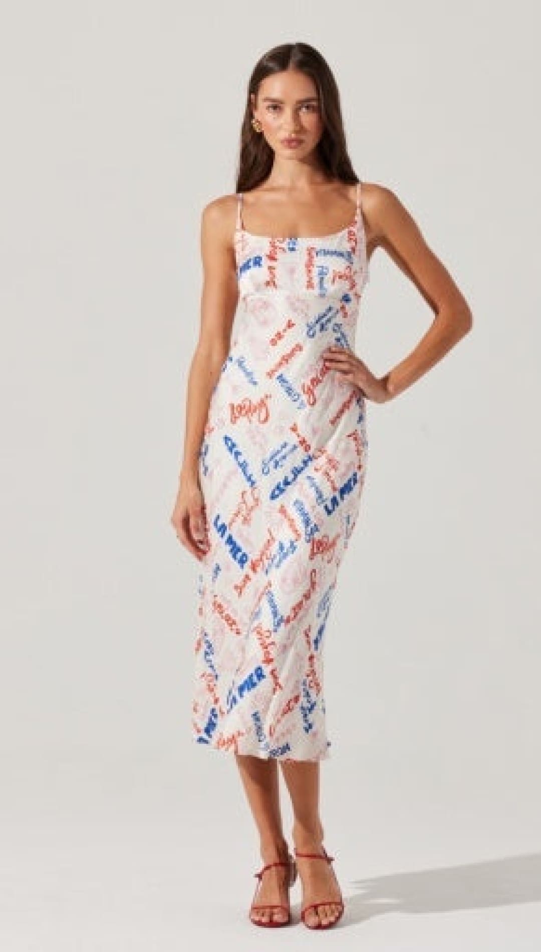 Sleeveless midi dress with printed text.