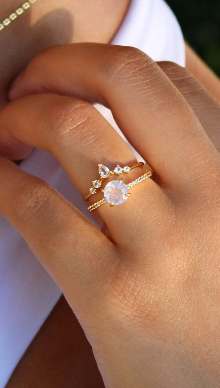 Gold rings with gemstones.