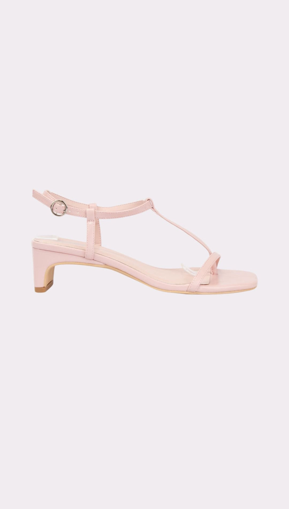 Pink T-strap heeled sandal.