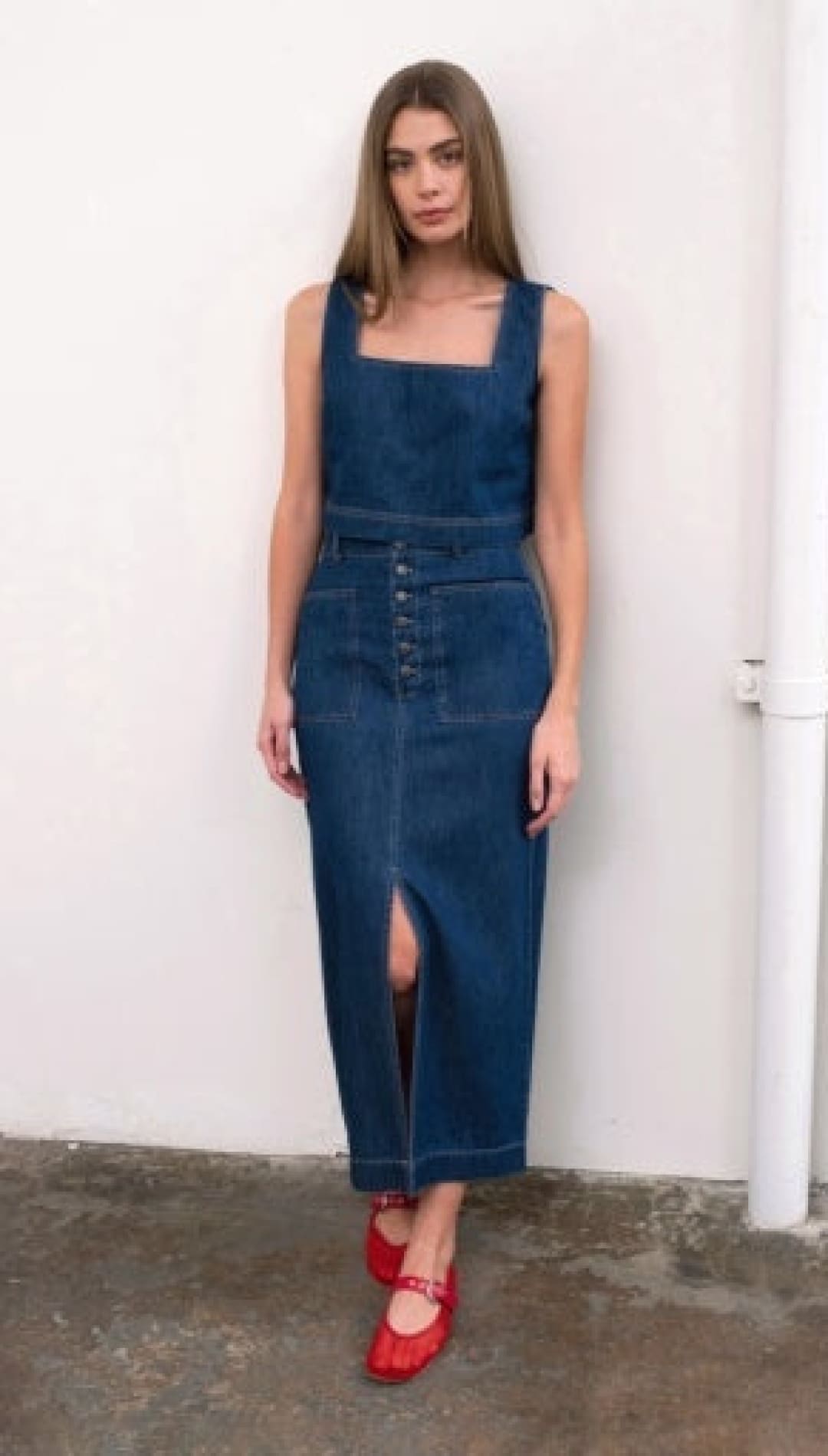 Denim midi dress with front slit.