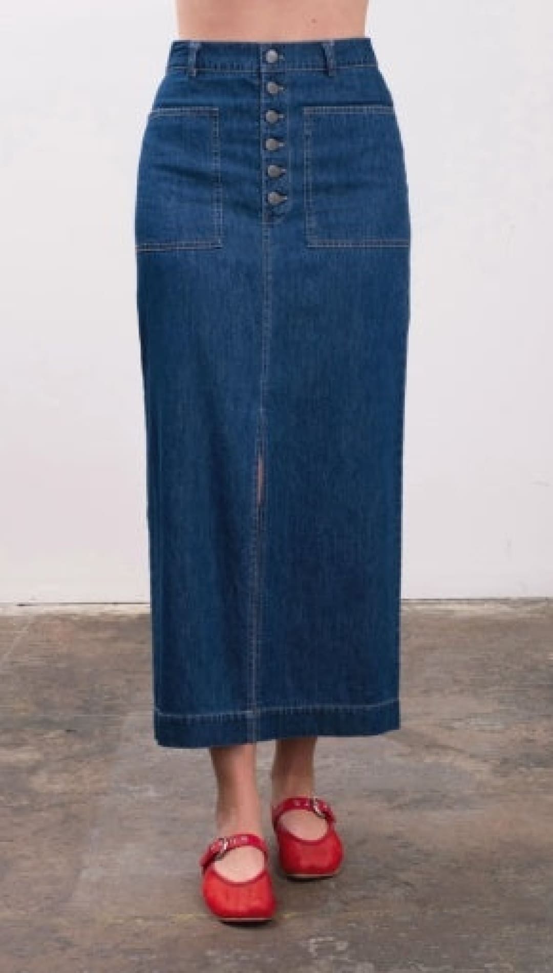 Blue denim button-front maxi skirt.