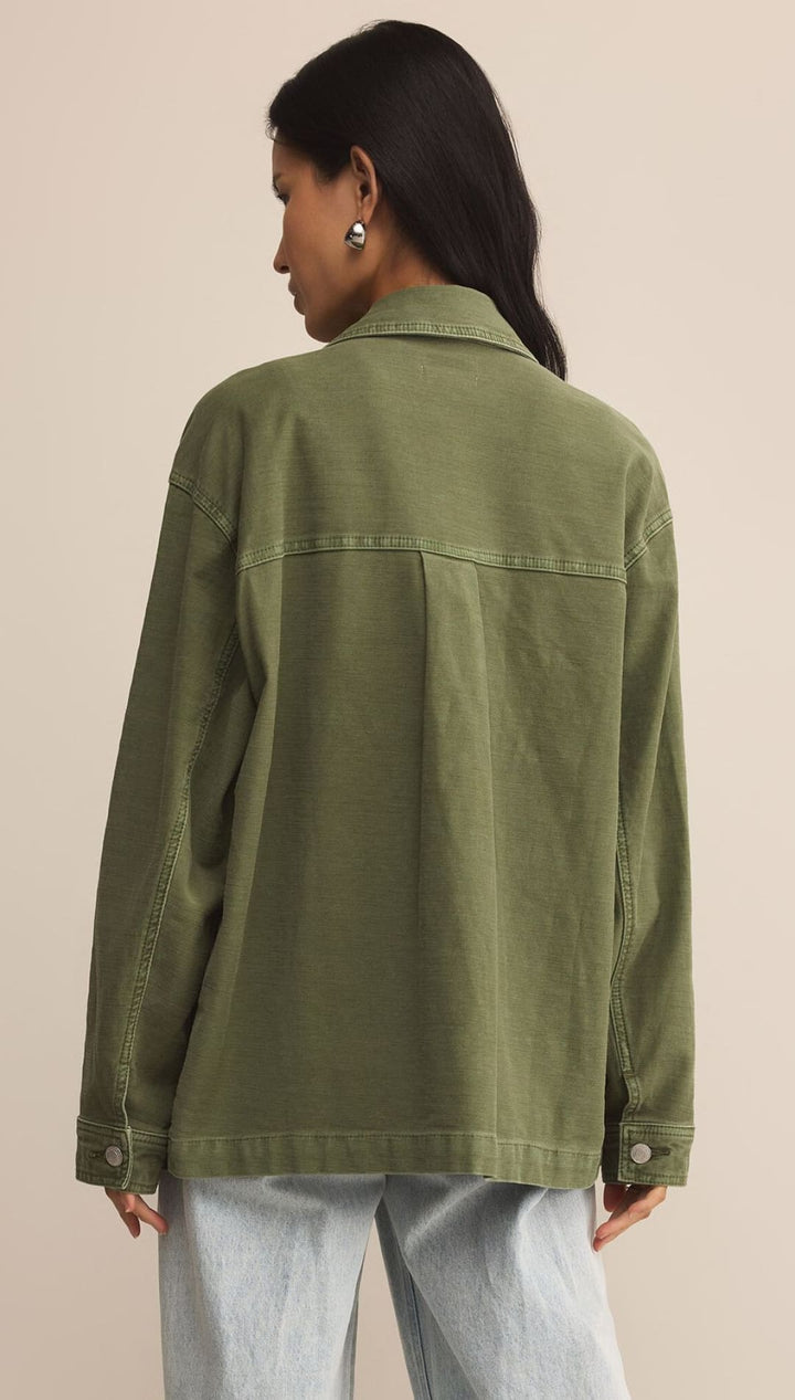 Women’s olive green oversized denim jacket.