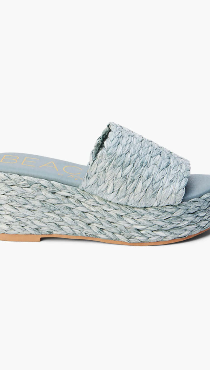 Blue woven platform sandal.