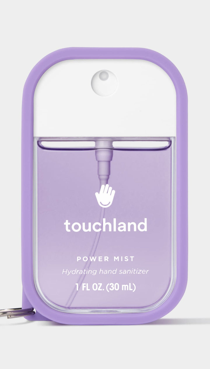Lavender touchland power mist hydrating hand sanitizer with clear plastic bottle and purple cap.