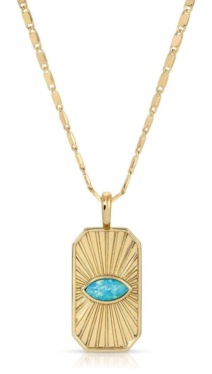 Gold necklace with turquoise eye pendant.