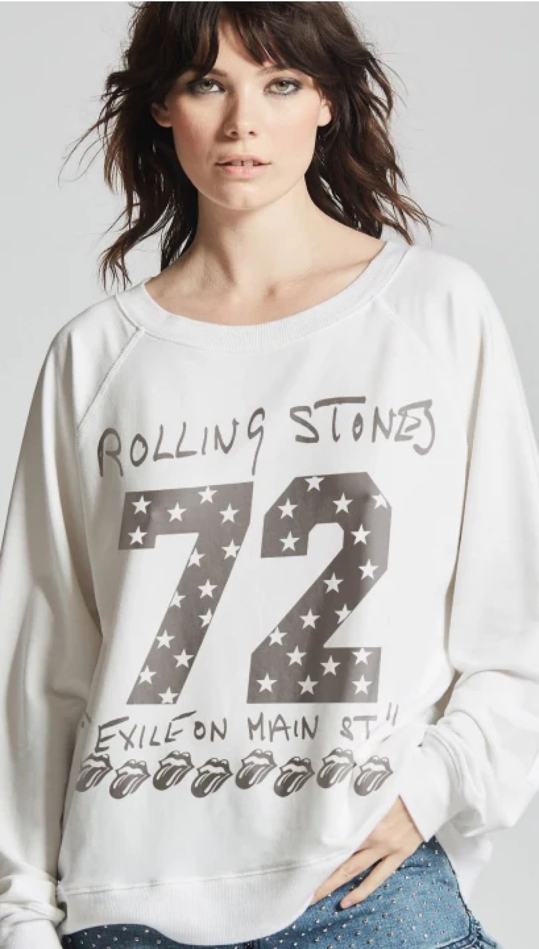 White Rolling Stones sweatshirt.