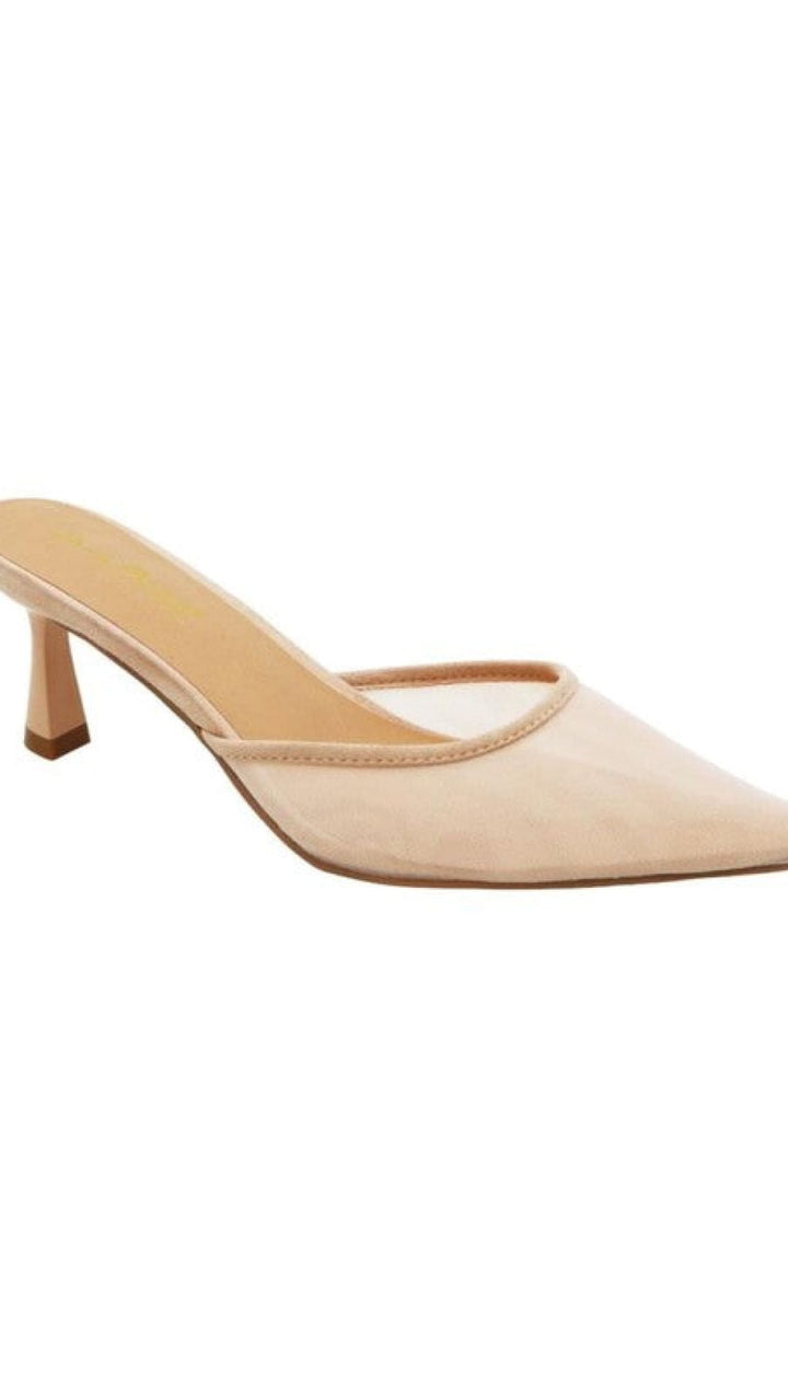 Beige pointed-toe heeled mule.
