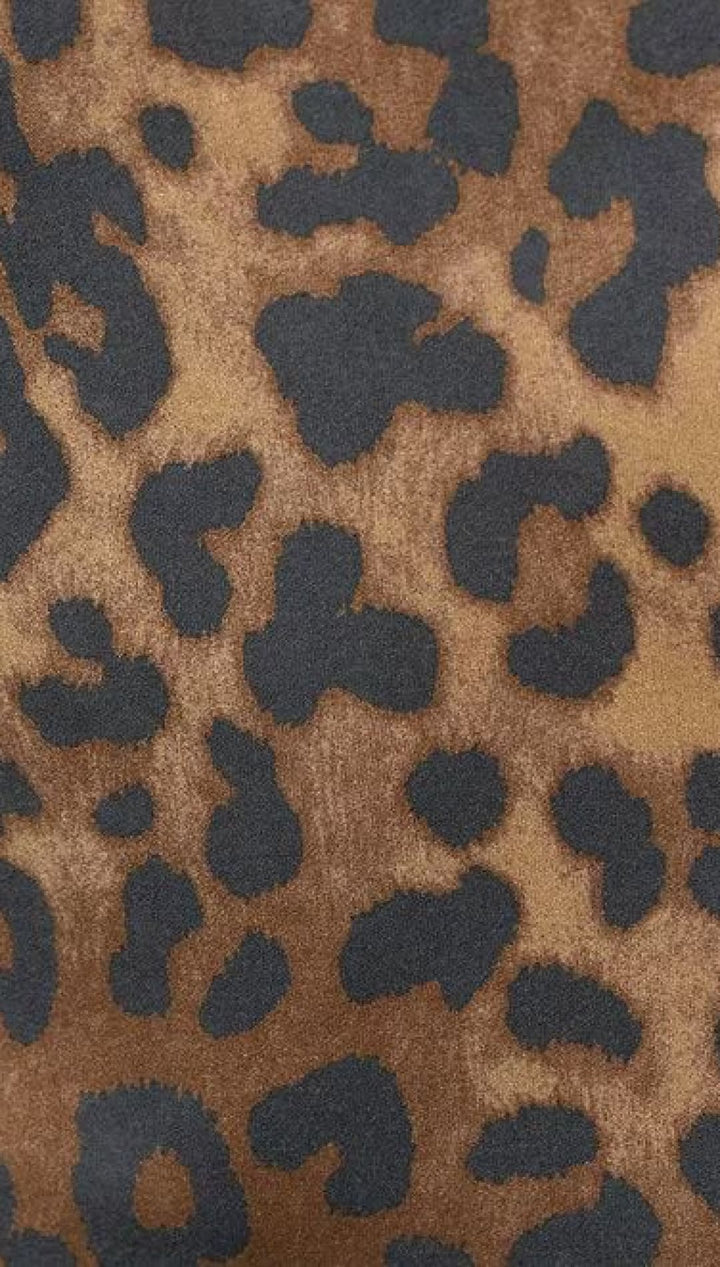 A brown and black leopard print fabric.