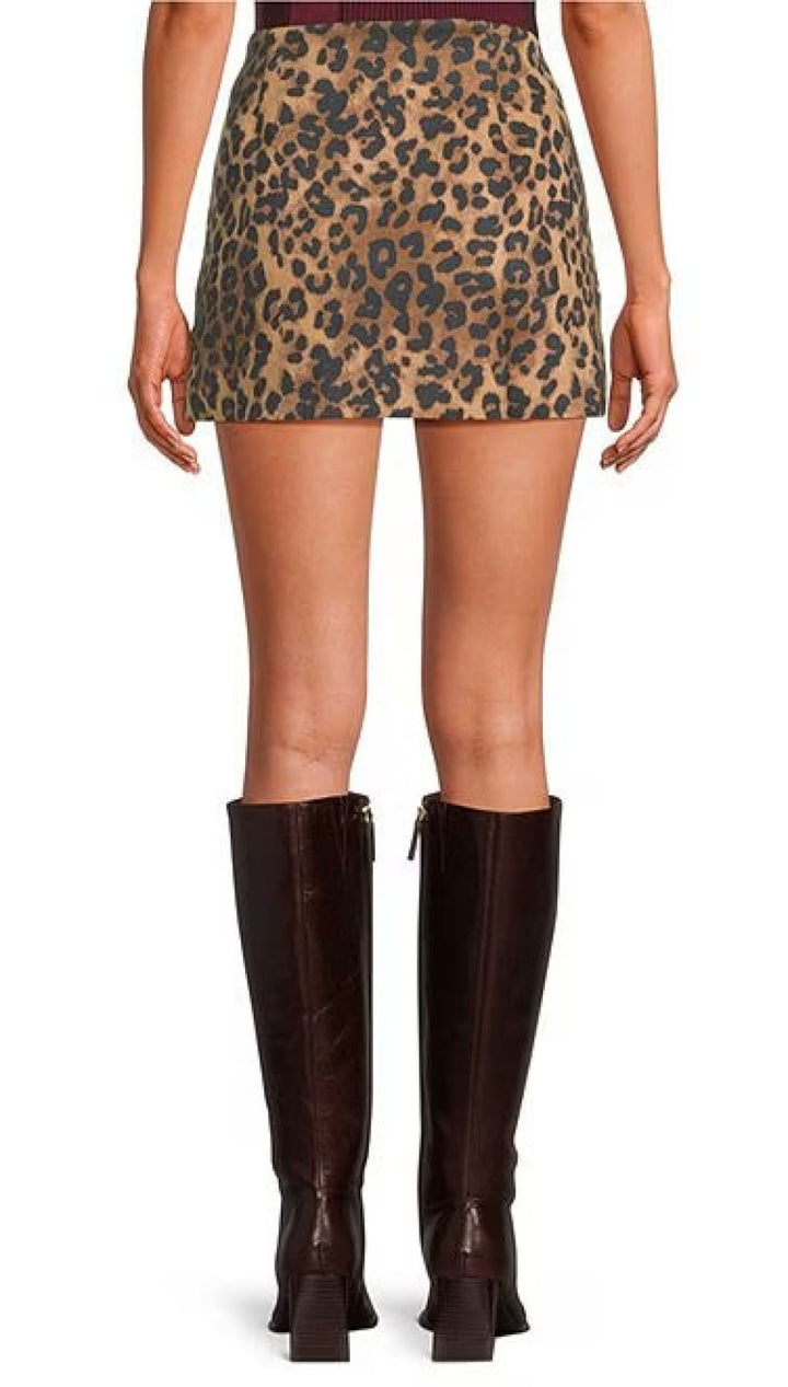 Leopard print mini skirt with dark brown knee-high boots