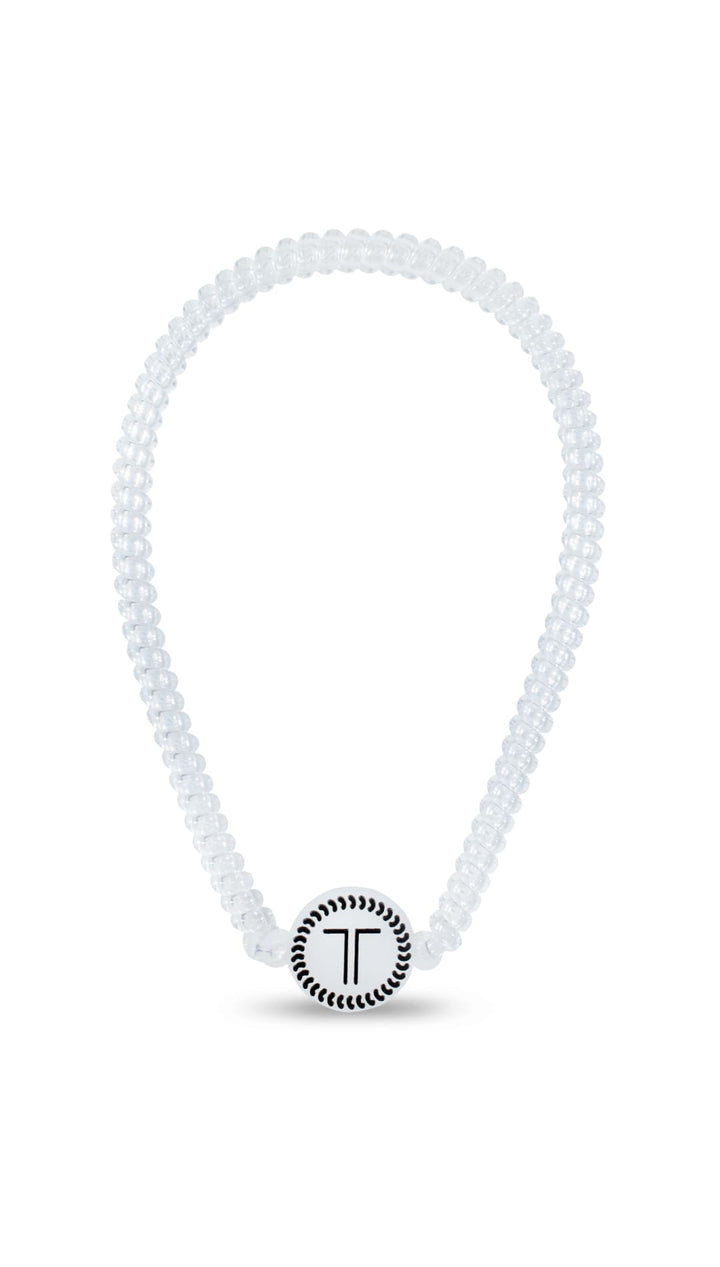 White diamond-studded necklace with a circular pendant featuring the letter ’t’ in silver.