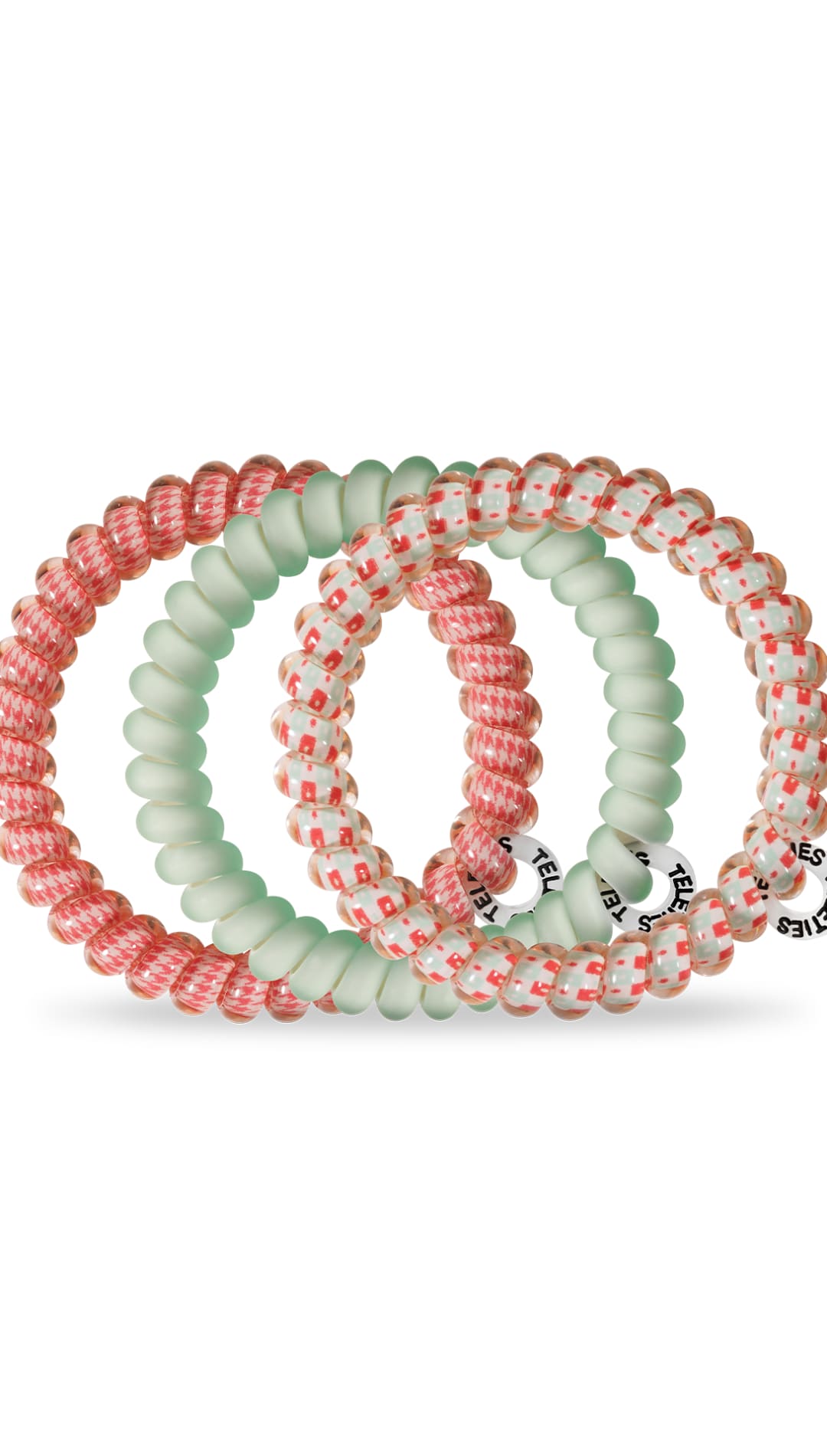 Coral and mint green braided hair ties set with white text.