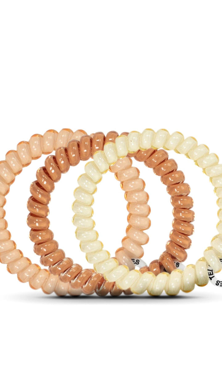 3-pack of braided hair ties in blush, beige and cream colors.