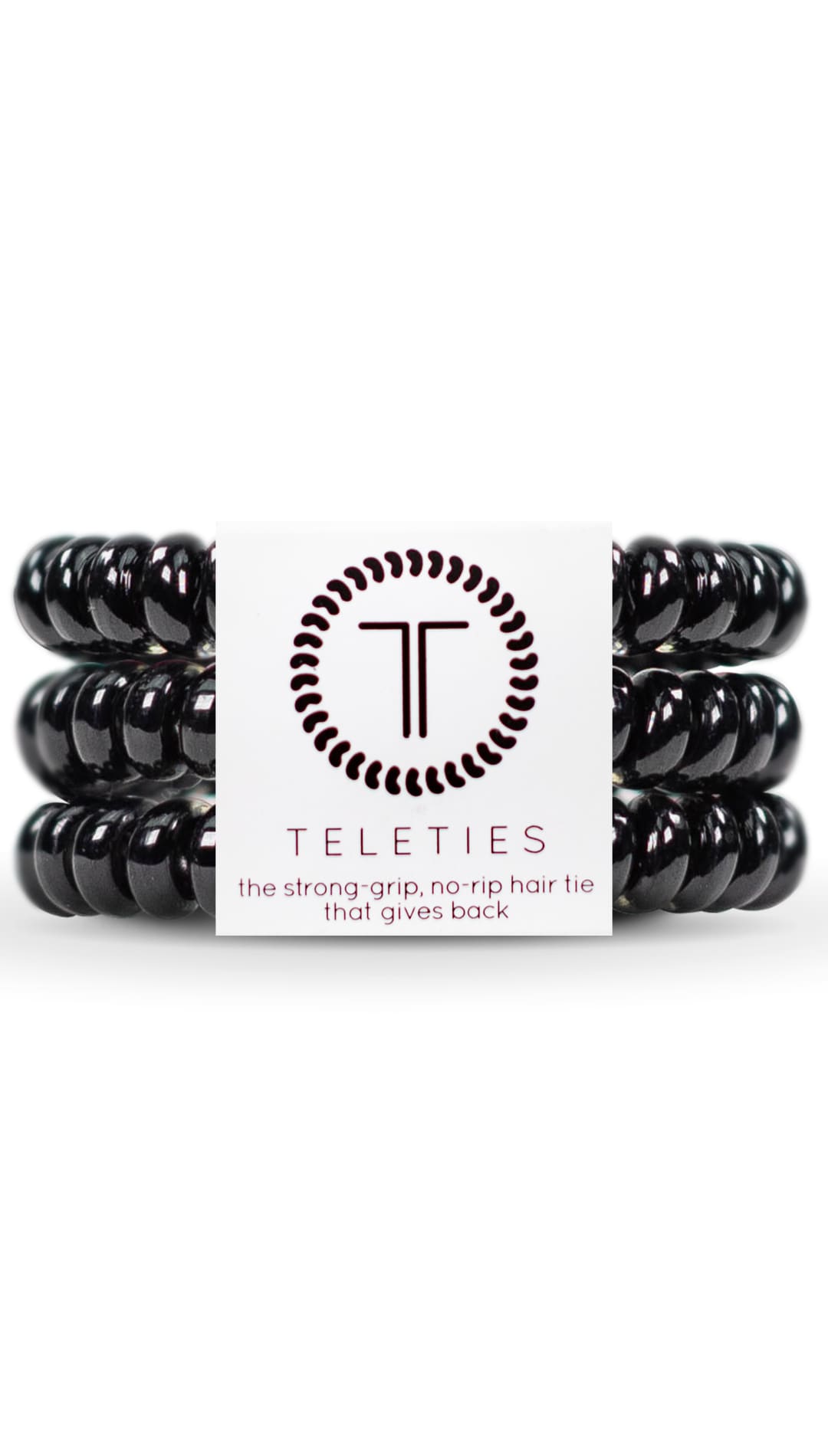 Black spiral hair ties with a circular logo featuring the letters ’tt’ in white and dark gray.