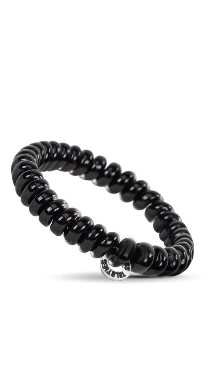 Black beaded bracelet with silver clasp