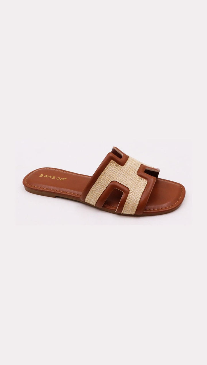 Brown and beige sandal.
