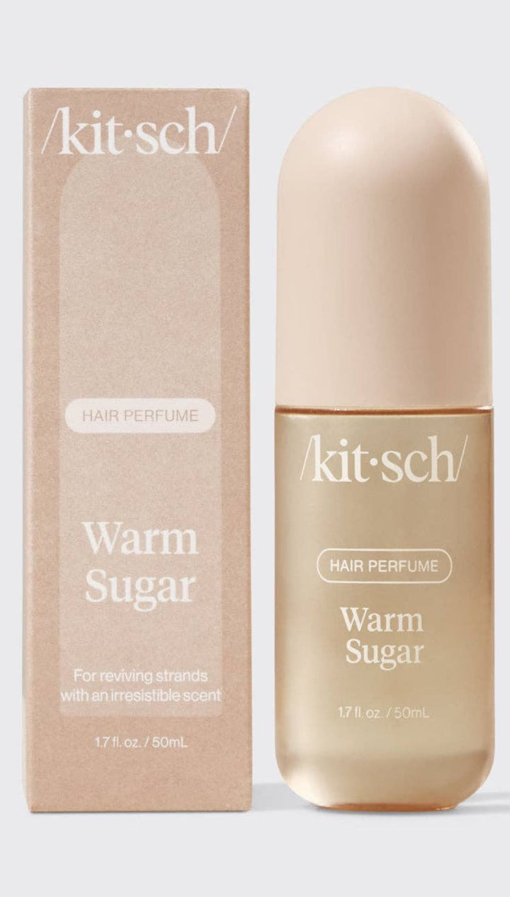 Beige and gold perfume bottle with ’warm sugar’ label, minimalist design.