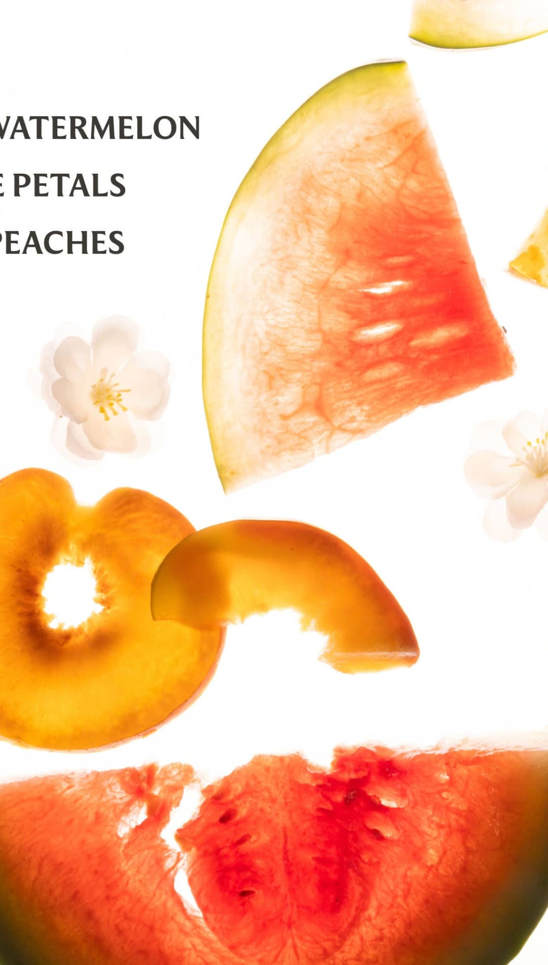Watermelon and peach slices with jasmine petals, vibrant red-green flesh, white rind, delicate flowers scattered among them.