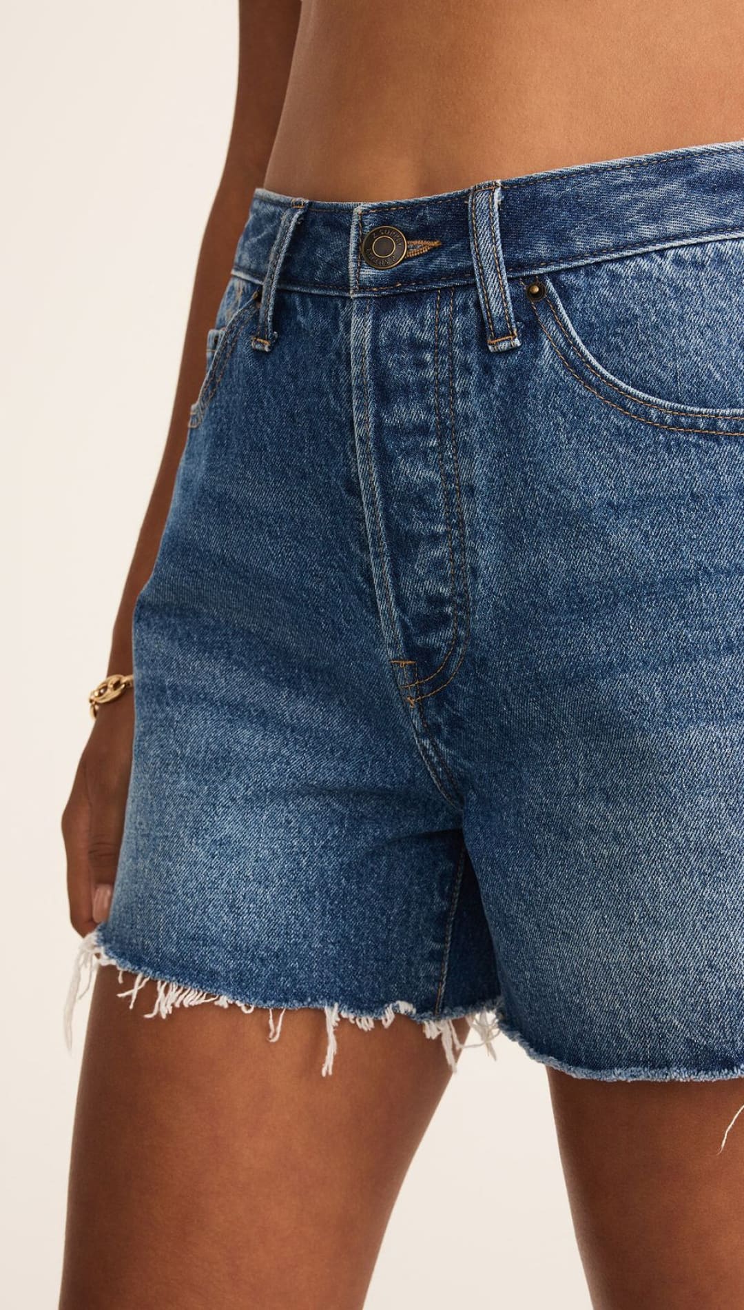 Blue denim shorts.