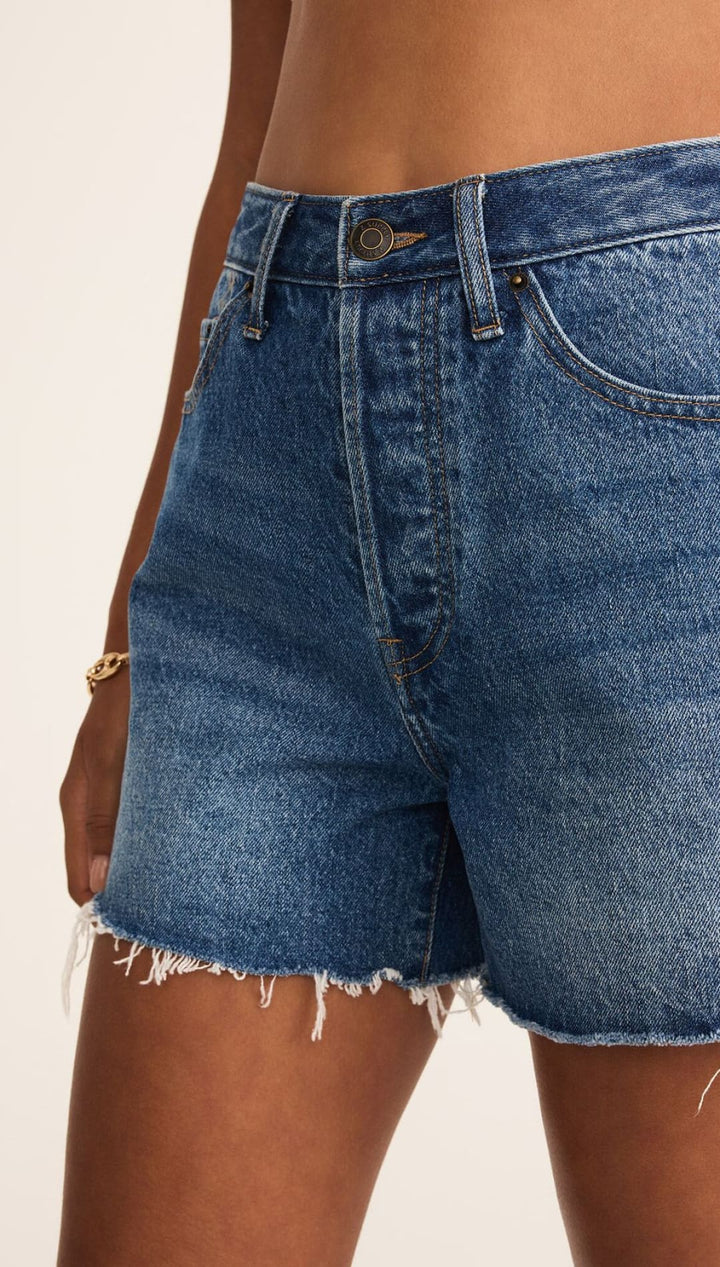 Blue denim shorts.