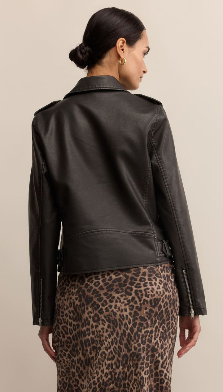 Black leather moto jacket with quilted shoulders and snap closures.