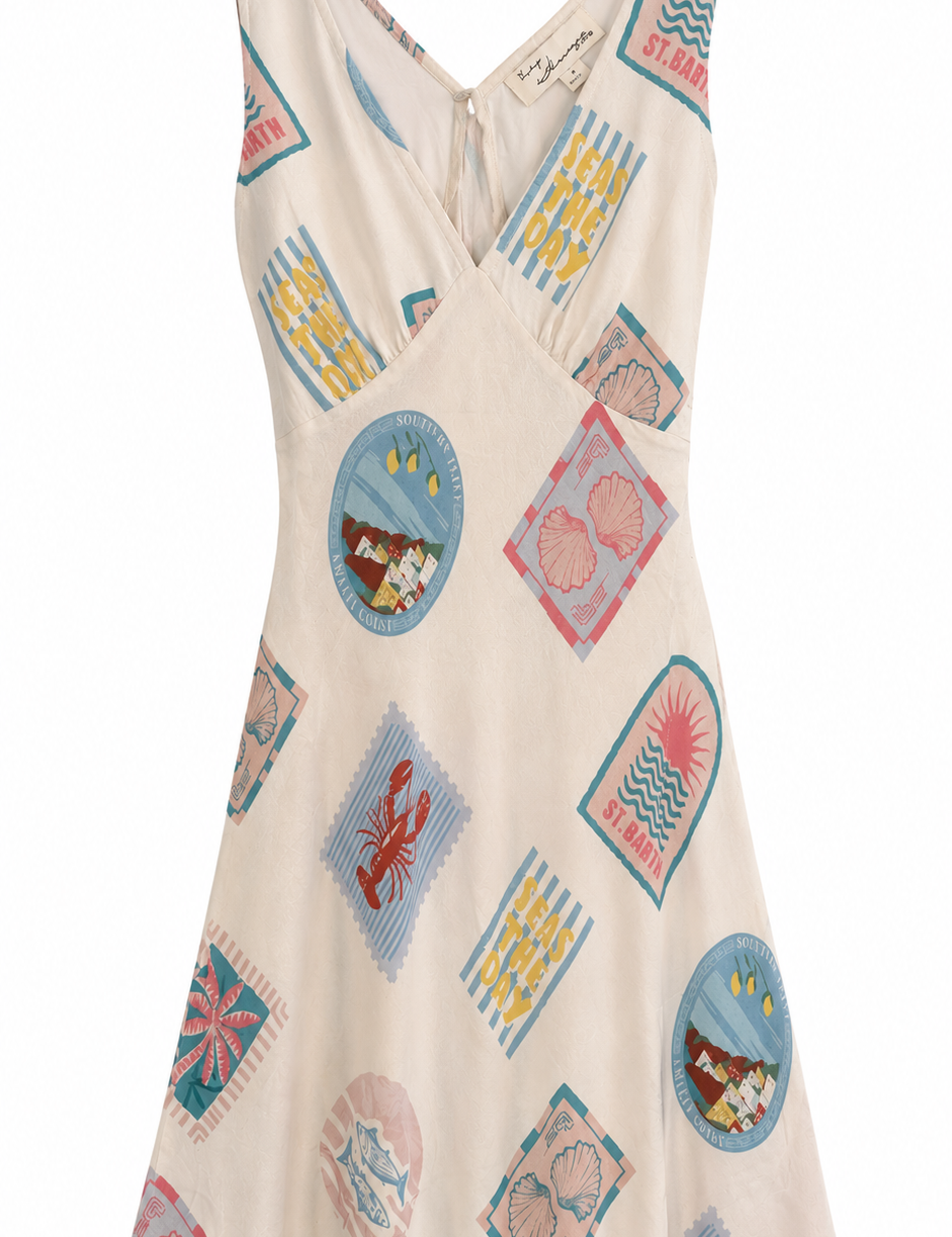 Beige dress with colorful graphic designs on a white background