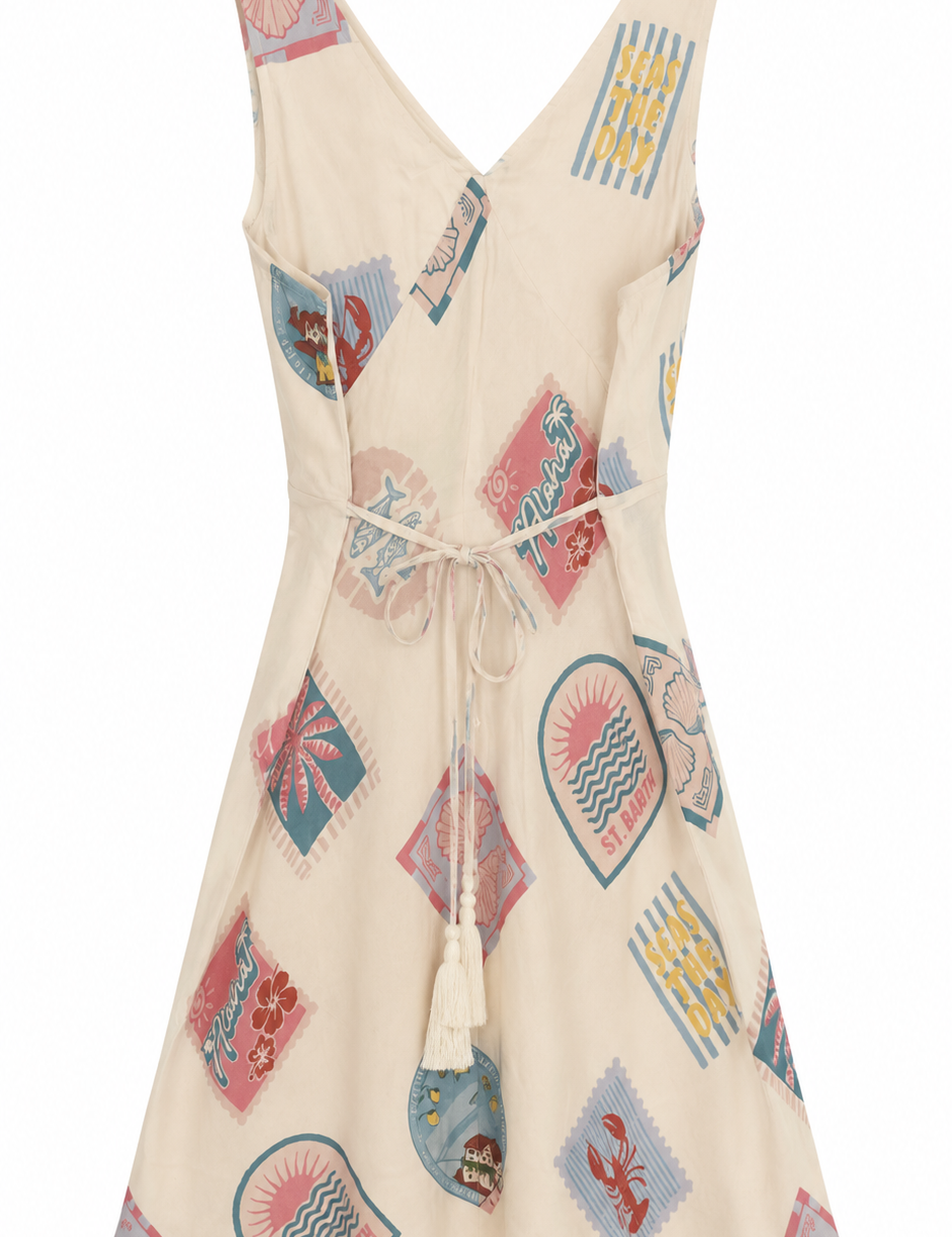 Beige dress with colorful geometric pattern on a white background