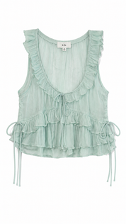 Light green ruffled top on a white background