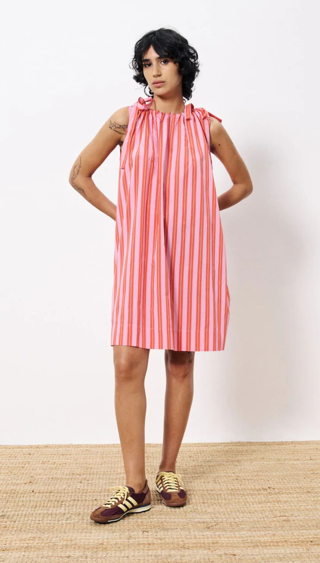 Pink striped sleeveless dress.