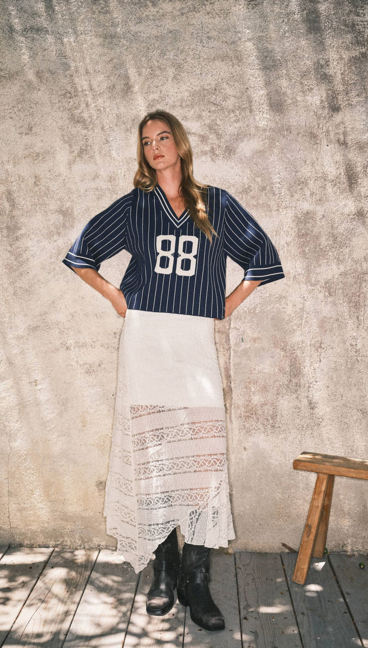 Striped navy and white baseball jersey with the number 88, casual wear.