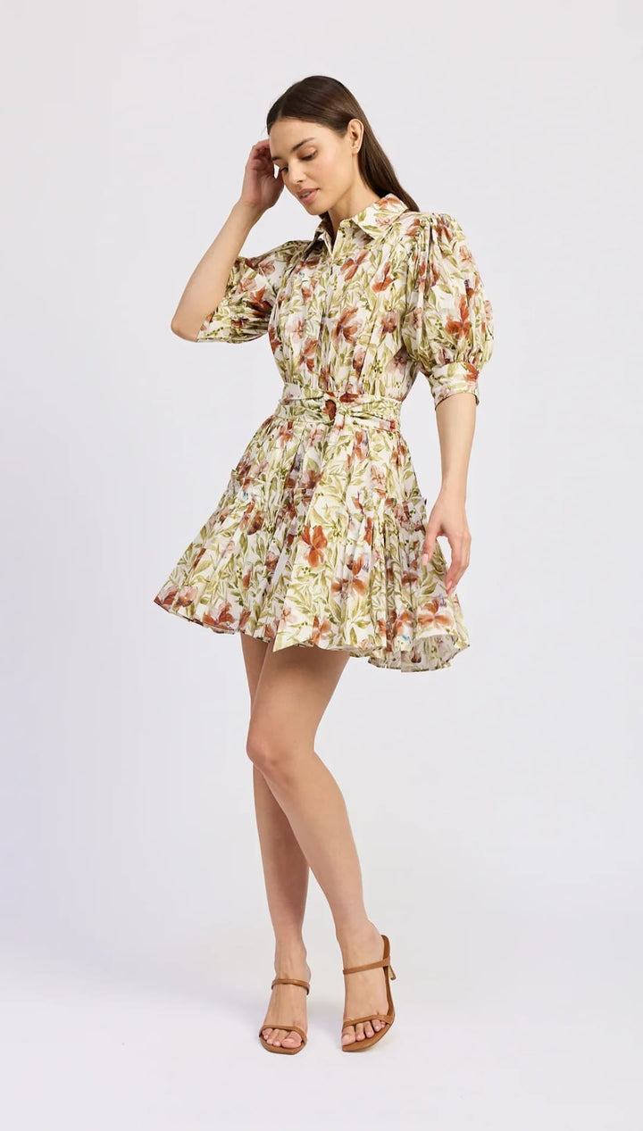 Floral print belted mini dress.