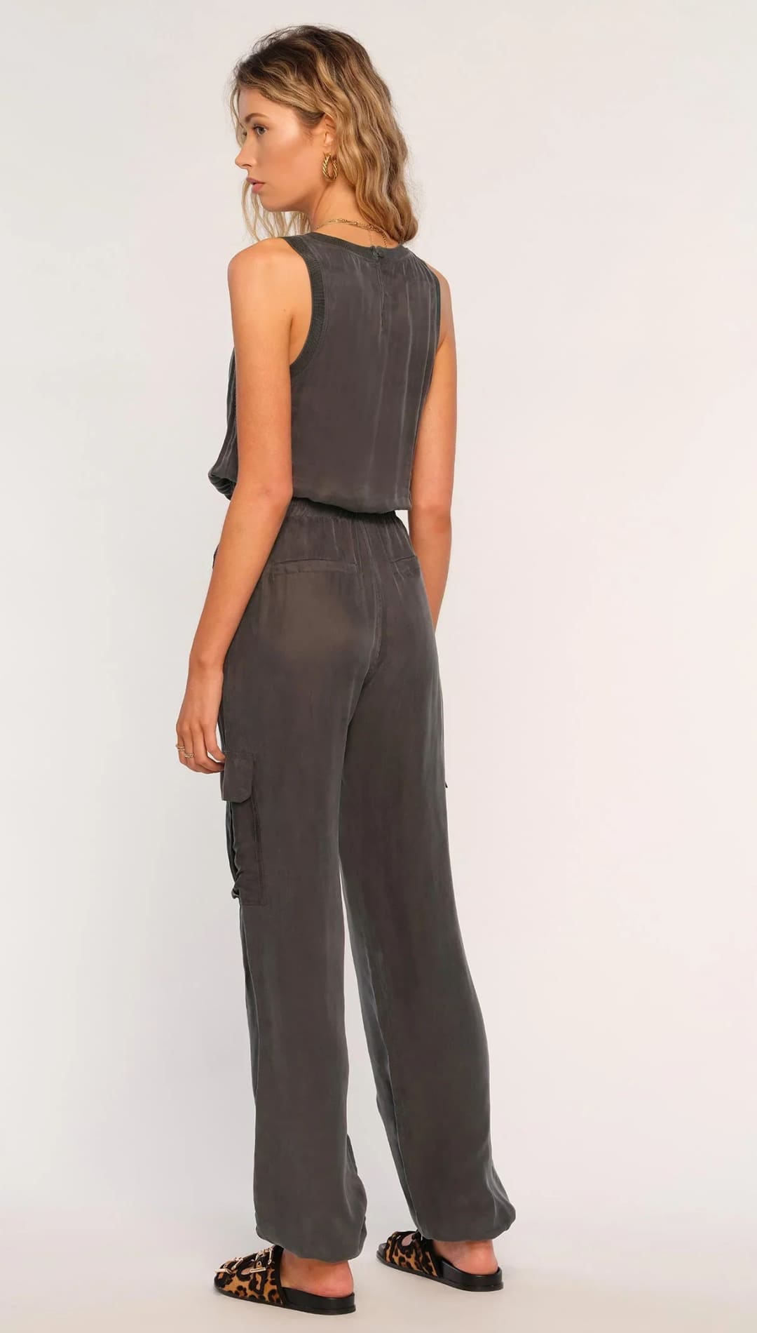 Gray sleeveless jumpsuit.