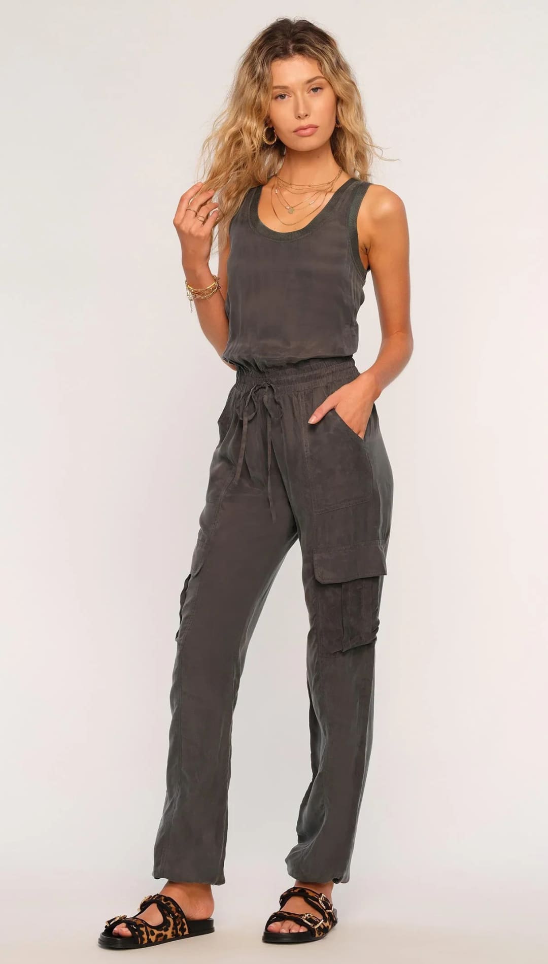 Gray sleeveless jumpsuit.