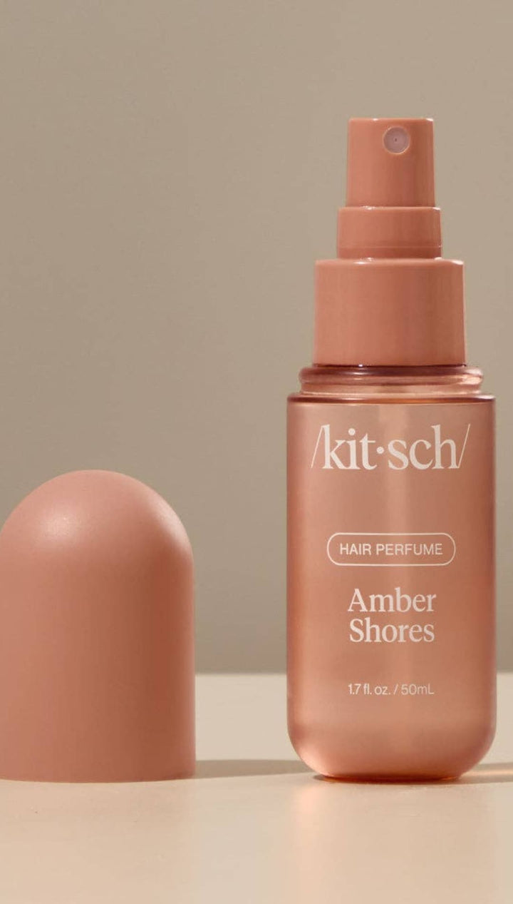Rose gold spray bottle with amber shores scent, kitsch brand