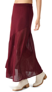 Maroon ankle-length skirt with a sheer overlay and ruffled hem.