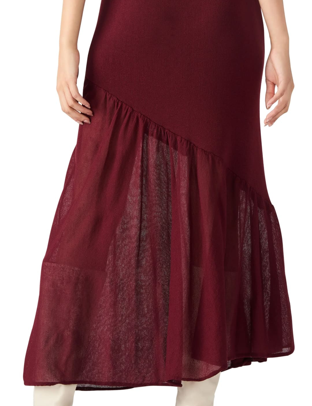 Women’s maroon maxi skirt with a sheer, ruffled, asymmetrical hem.
