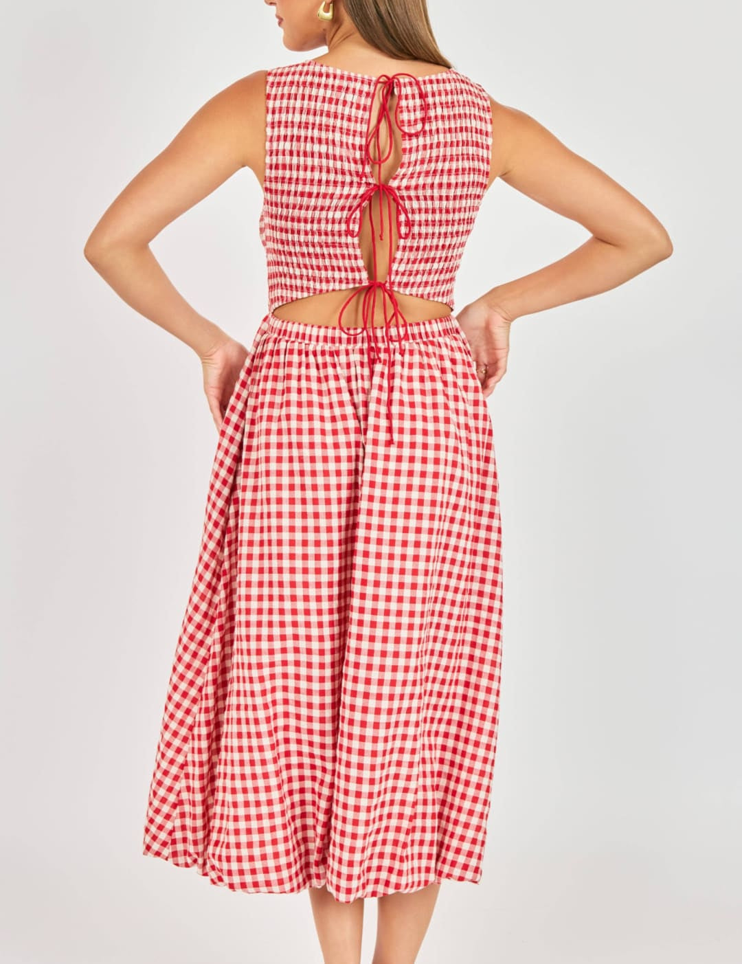Red and white gingham midi dress with a crop top featuring back ties.