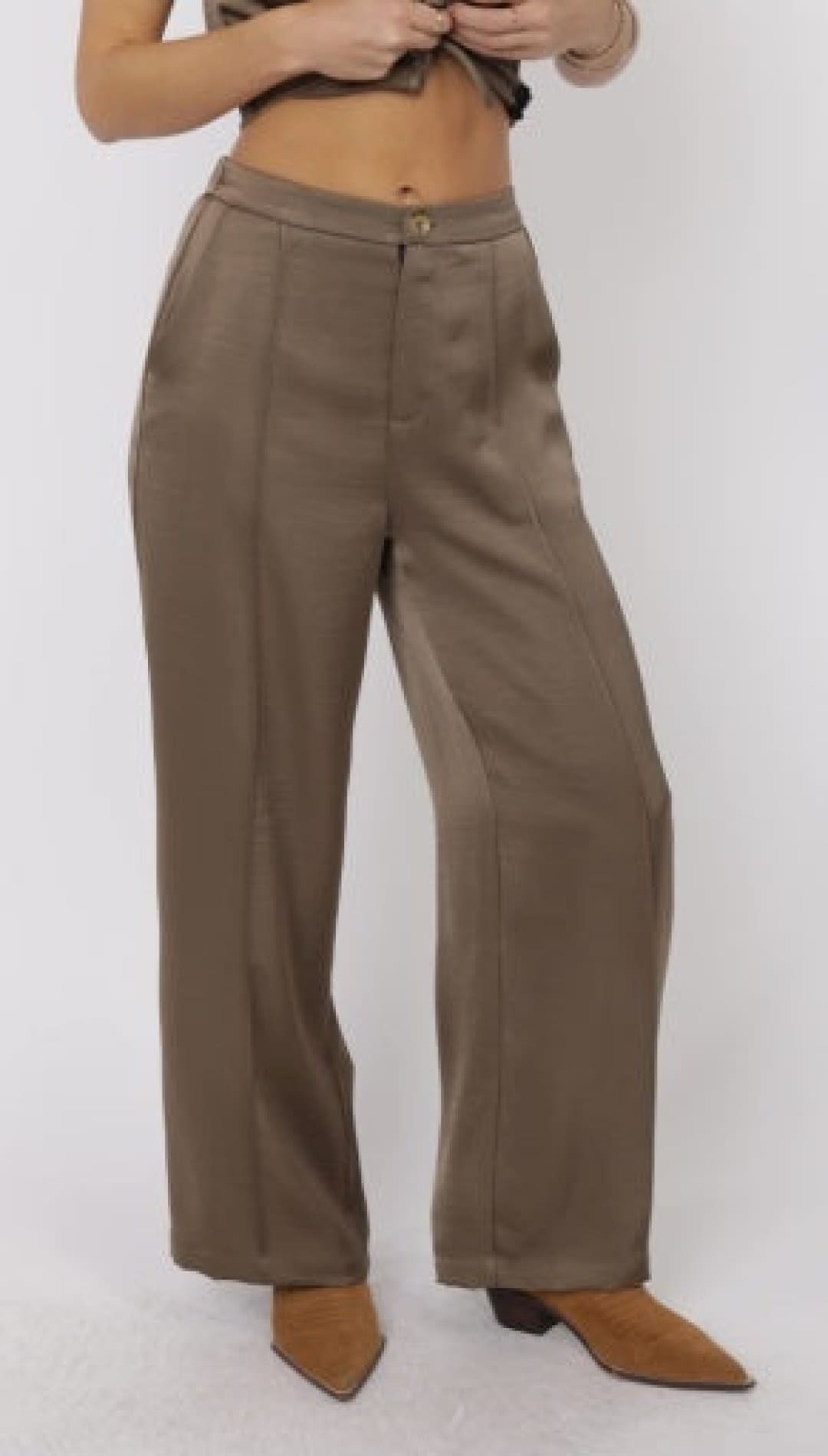 Women’s high-waisted, wide-leg satin trousers in a muted olive green.